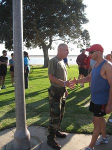 Kevin McCarey (left) greeting friends of JT