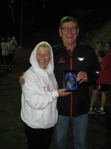 Anne & Jim Ryun with Mexico City `68 silver medal