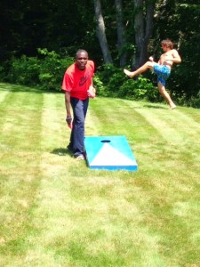 Stephen Kipkosgei-Kibet takes aim (who knows what the air guitarist in back is up to)