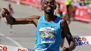 Kogo with Ben True on his heels