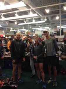 BRC store manager Greg Welch; Brooks rep Kent Adamson; buyer Henry Guzman; sales associate Sarah Rebick; and RnR Denver race director Alan Culpepper at Boulder Running Company
