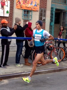 Italy's Daniel Meucci takes lead in mile 11 on Bedford Ave.  