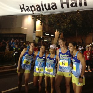 First group of Team Hawaii about to start along Waikiki Beach, including winner Eri MacDonald on far left