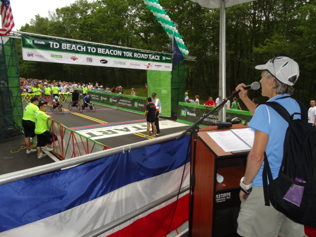 Race Founder Joan Benoit Samuelson addresses the field.