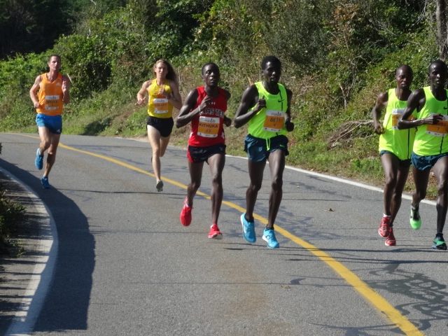 Ben Bruce and 2014 NC State All-American Andrew Colley (5th, 33:27) press to stay close to the leaders through 4:38 opening mile