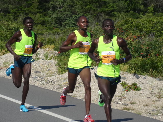 3 miles in 14:39 (4:33) with Sambu finding his rhythm of the flat stretch of Surf Drive.  Kogo and Bett suffering.