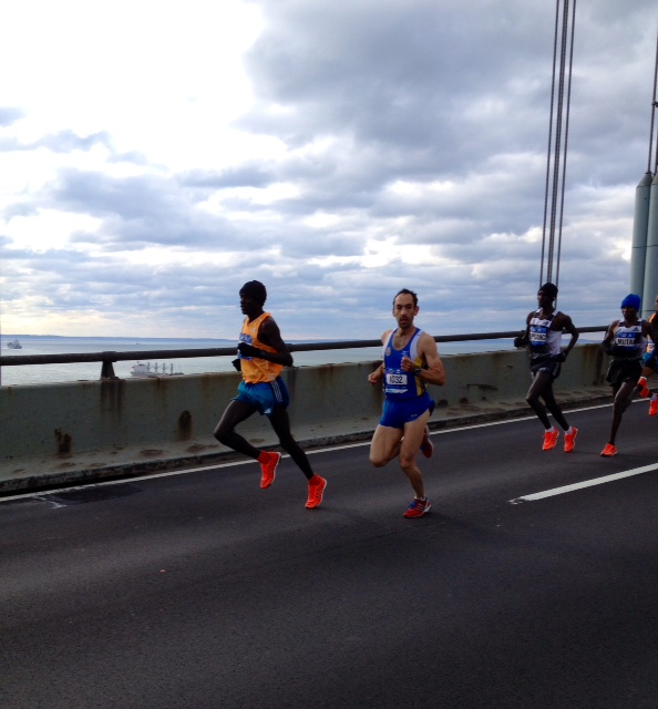 Peter Kirui leads off the Verrazano Narrows Bridge