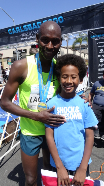 Bernard Lagat with son Mika