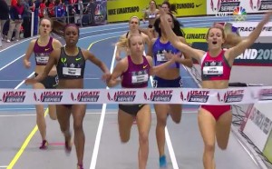 Lauren Wallace holds the rail and takes the win in women's 1000m.