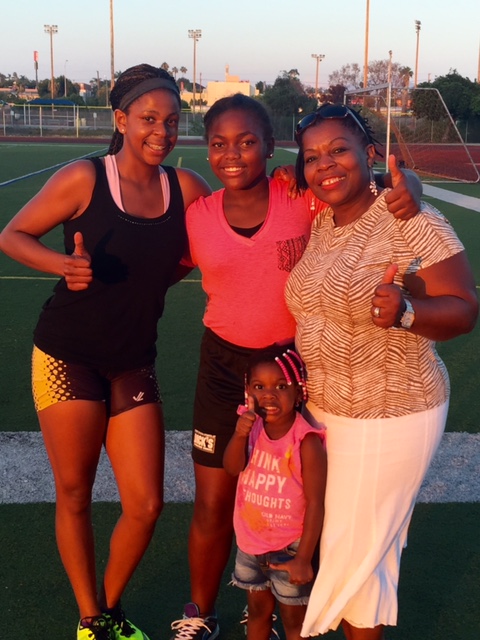 The Gray family: 13 year-old Tashi runs for the San Diego Cheetas, 12 year-old Ramisi won the women's shot put at 23' 5
