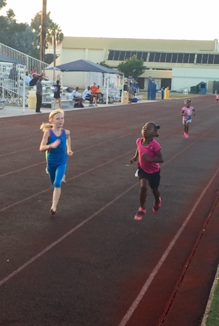 Jenna competing in the 220.