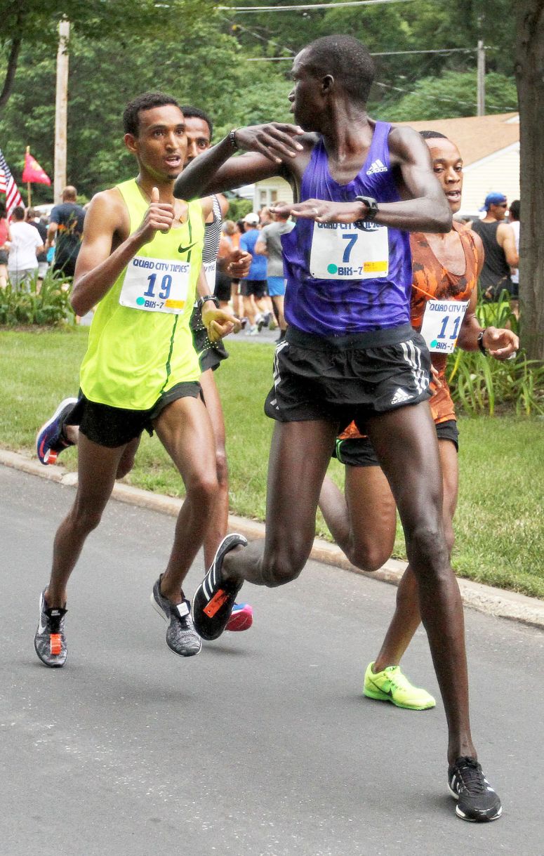 Silas Kipruto lashes out at Teshome Mekonen (19 in yellow) as #11 Isaac Mwangi considers his options