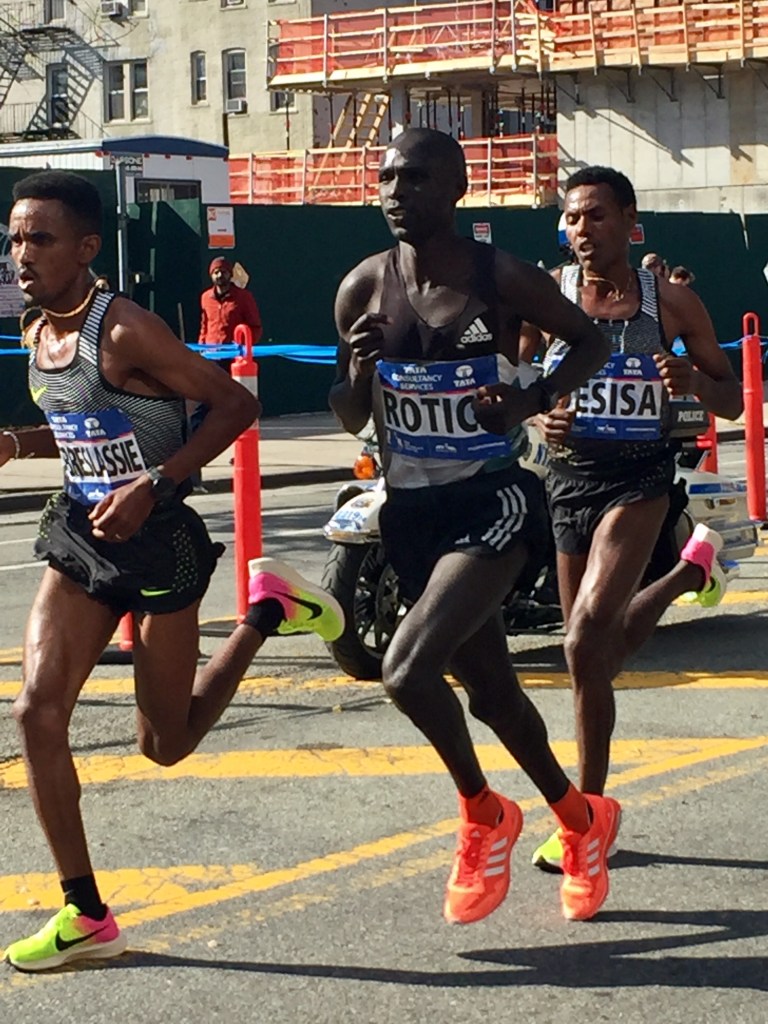 Big three run free. Ghebrslassie, Lucas Rotich & Lelisa Desisa pass halfway in 1:04:25